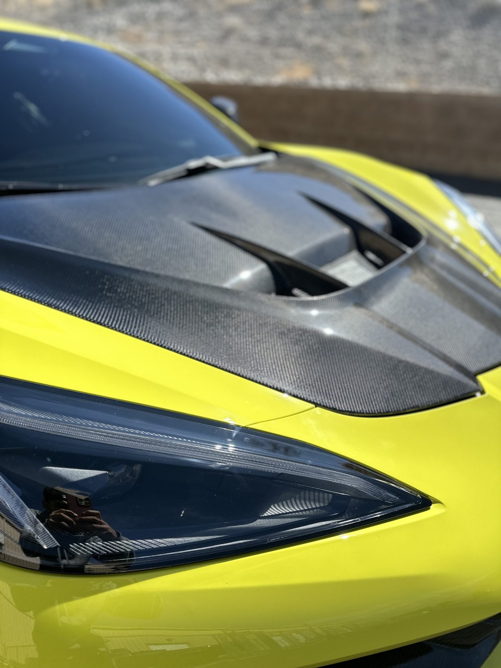 A yellow corvette with paint protection film and ceramic coating applied.